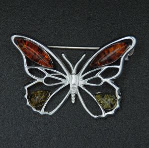 Srebrna broszka motyl z bursztynem